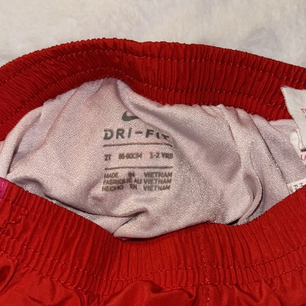 Nike dry fit shorts, size 2T color, red, pink and white